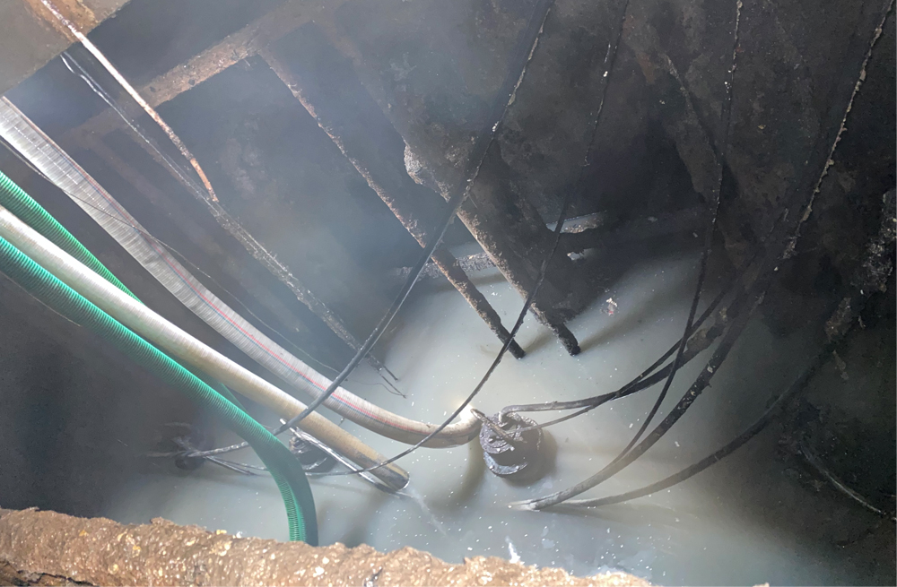 272石化村商城污水池清运